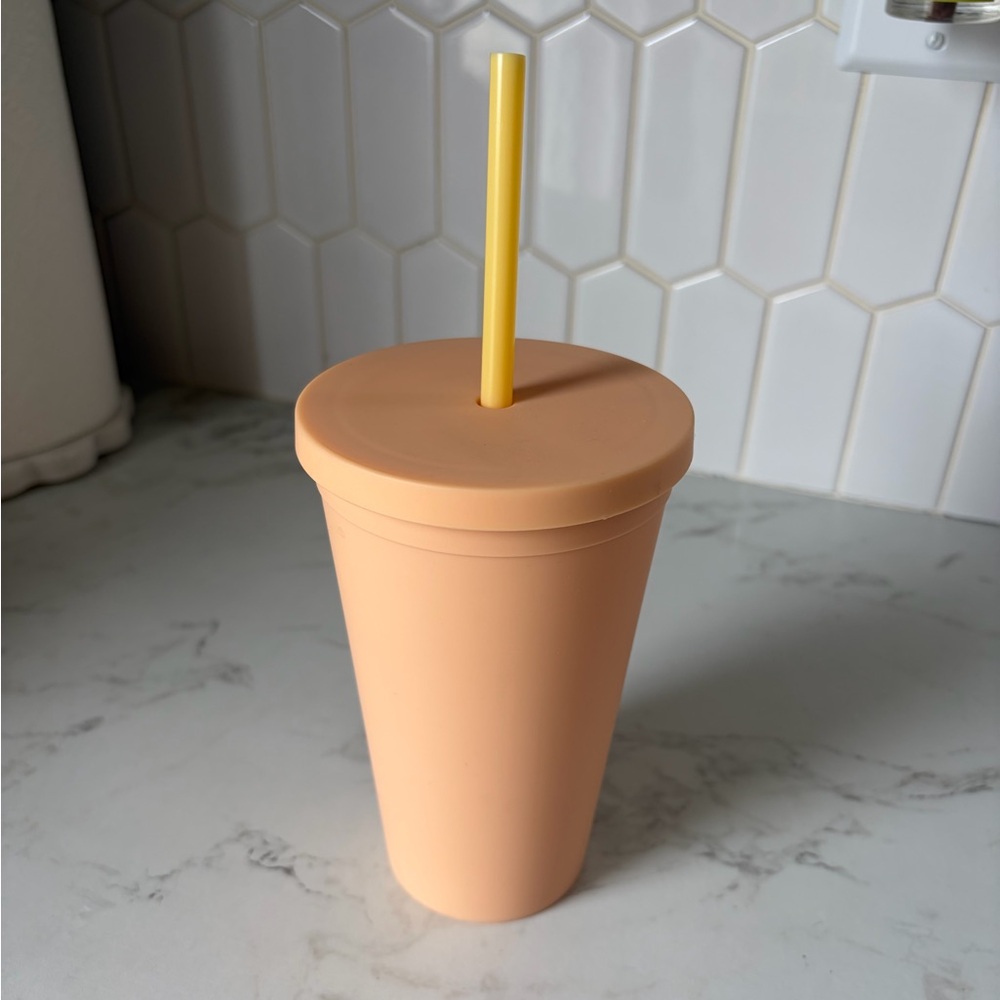 Elegant Peach Tumbler with Yellow Straw